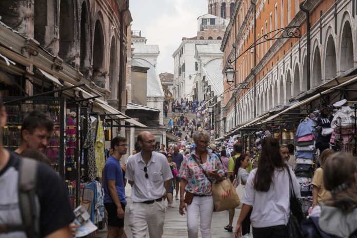 Venice is limiting tourist groups to 25 people starting in June to protect the popular lagoon city