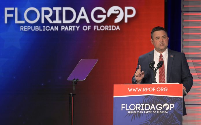 Republican Party of Florida Chairman Christian Ziegler addresses attendees at the Republican Party of Florida Freedom Summit, Nov. 4, 2023, in Kissimmee, Fla. The Republican Party of Florida will hold a special meeting Monday, Jan. 8, 2024, to vote on removing Ziegler and select a new leader as police investigate a rape accusation against him, a vote that comes the week before Gov. Ron DeSantis competes in Iowa's first-in-the-nation presidential caucus.