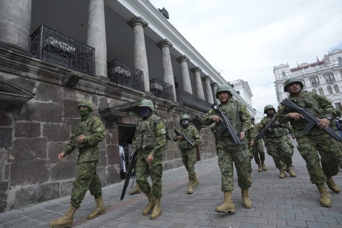 Armed men storm an Ecuador TV studio during a live broadcast as attacks in the country escalate