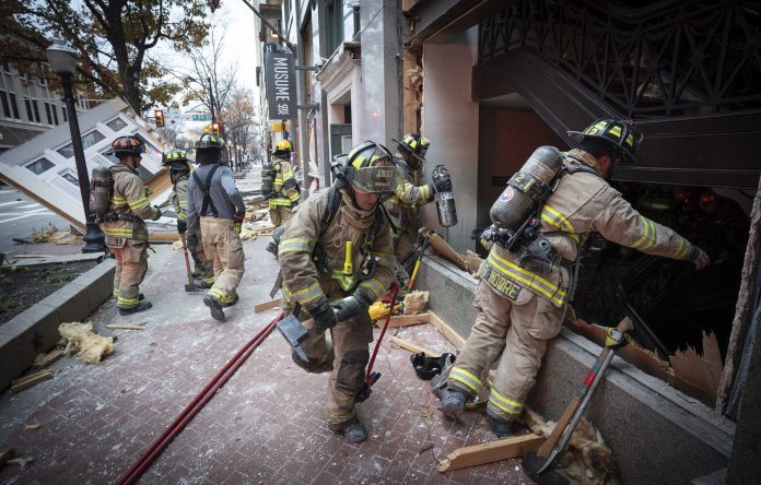 Firefighters investigate role of gas in explosion at historic Texas hotel that injured 21