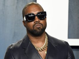 FILE - Kanye West arrives at the Vanity Fair Oscar Party, Feb. 9, 2020, in Beverly Hills, Calif. The estate of Donna Summer sued Ye, formerly Kanye West, and Ty Dolla $ign on Tuesday, Feb. 27, 2024, for what its attorneys say is the “shamelessly” illegal use of her 1977 song “I Feel Love” in their collaboration “Good (Don’t Die).” The copyright infringement lawsuit was filed in federal court in Los Angeles by Summer’s husband Bruce Sudano in his capacity as executor of the estate of the singer-songwriter and “Disco Queen,” who died in 2012. (Photo by Evan Agostini/Invision/AP, File)