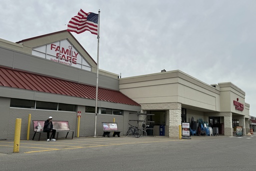 Woman was living inside rooftop grocery store sign with computer and coffee maker for a year