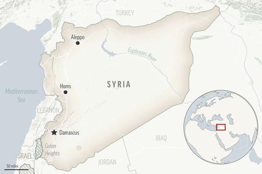 Syria’s Kurdish-led force hands over 2 IS militants suspected in 2014 mass killing of Iraqi troops