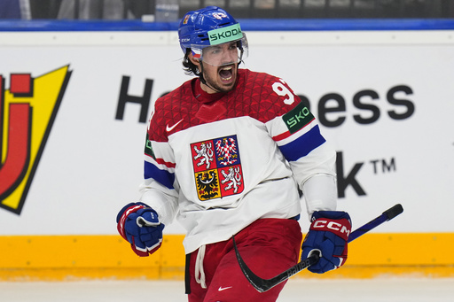 Slovakia upsets the US in OT at ice hockey worlds and Finland eases past Norway