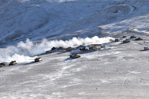 An Indian military tank sinks while crossing a river in a region bordering China, killing 5 soldiers