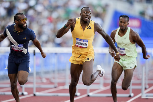 Olympics and unfinished business await for hurdler Holloway while Sha’Carri and Lyles keep blazing