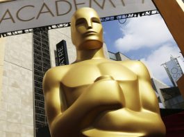 FILE - An Oscar statue appears outside the Dolby Theatre for the 87th Academy Awards in Los Angeles on Feb. 21, 2015. (Photo by Matt Sayles/Invision/AP, File)