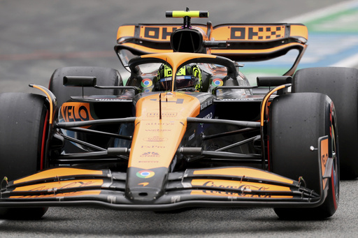 Unfazed by fire in McLaren’s facility, Norris edges Verstappen for pole at Spanish GP