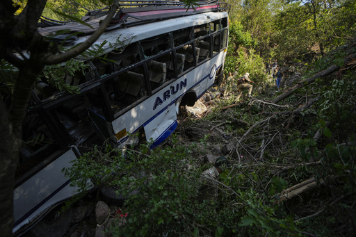 At least 9 dead after suspected militants in Kashmir fire at Hindu pilgrims, sending bus into gorge