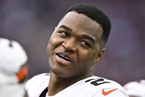 Browns receiver Amari Cooper restructures final year of contract, reports to camp, AP source says