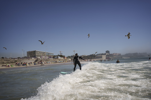 Church in Portugal combines surfing culture and worship with the motto: “We embrace waves and Jesus.”