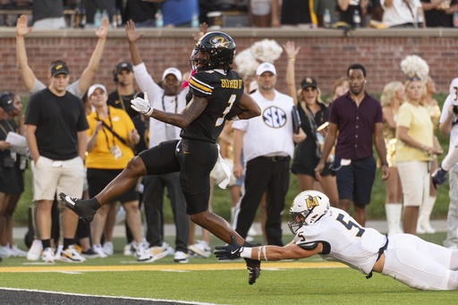 Brady Cook and Luther Burden III showcase No. 11 Missouri’s promise in dominant 51-0 victory over Murray State