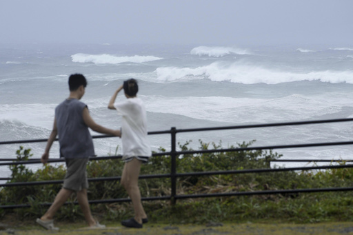 Typhoon Ampil departs Japan with train services back in operation and minimal damage recorded