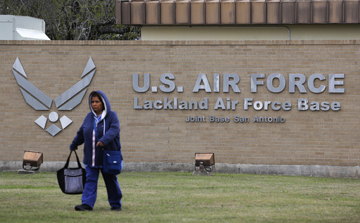 Incident involving exchange of gunfire at Joint Base San Antonio-Lackland between security personnel and passing car