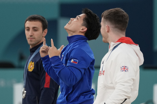 Filipino gymnast hailed as hero and rewarded with lifelong free buffets after winning 2 Olympic golds in Paris