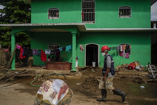 Along Mexico’s Pacific coast, flooding from Hurricane John left devastated towns and 17 dead