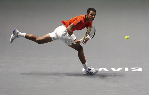 Canada and Germany poised to progress in Davis Cup Finals following victories in group stage.