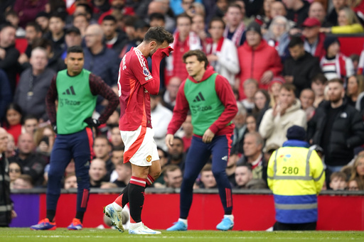 Bruno Fernandes of Manchester United receives red card for reckless tackle during match with Tottenham