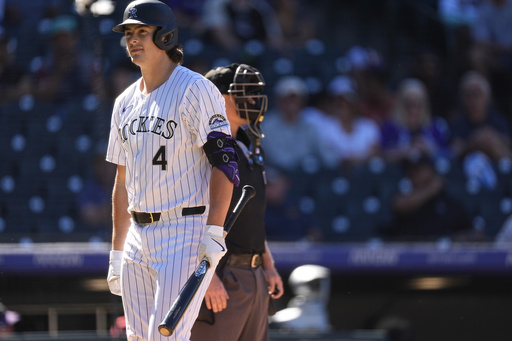 Carroll hits two homers and Rodriguez records 11 strikeouts as Diamondbacks defeat Rockies 9-4