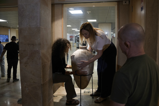 Israeli museum repairs ancient jar broken by child, now back on display