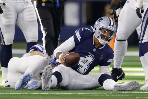 Lions’ Aidan Hutchinson taken off field via cart due to severe leg injury against Cowboys.