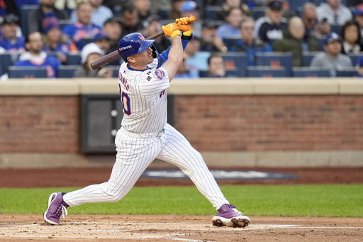 New York Mets' Pete Alonso hits a three-run home run against the Los Angeles Dodgers during the first inning in Game 5 of a baseball NL Championship Series, Friday, Oct. 18, 2024, in New York. (AP Photo/Frank Franklin II)