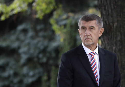 Slovakia and ex-Czech Prime Minister resolve legal dispute regarding ties to communist-era secret police.