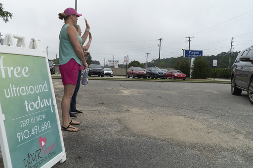 Young women in North Carolina weigh abortion bans as they assess their choices between Harris and Trump.