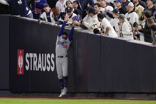 Fan thrown out of Yankee Stadium for attempting to steal ball from Mookie Betts’ glove during World Series