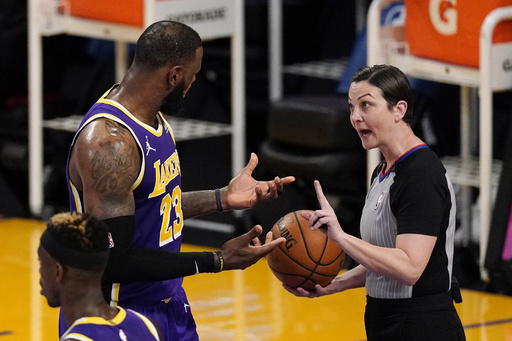 NBA referee Lauren Holtkamp-Sterling announces retirement due to knee problems.