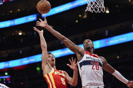 Kuzma tallies 25 points in Wizards’ inaugural win, edging out Hawks 121-119.