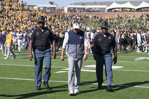 Hugh Freeze leads Auburn’s Tigers in matchup versus Kentucky after a late arrival due to illness