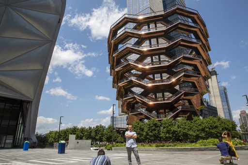 The Vessel in Manhattan, a tourist attraction shut down due to suicides, reopens equipped with enhanced safety measures.