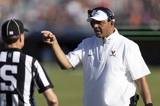 Clemson’s Swinney squares off against former pupil Elliott from Virginia.