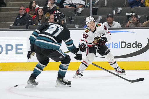 Will Smith nets two goals for his initial NHL scores as Sharks defeat Blackhawks 3-2 for their third consecutive victory.