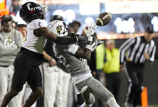 Ranked No. 23 Colorado secures bowl eligibility thanks to outstanding performances from Heisman contenders Hunter and Sanders.