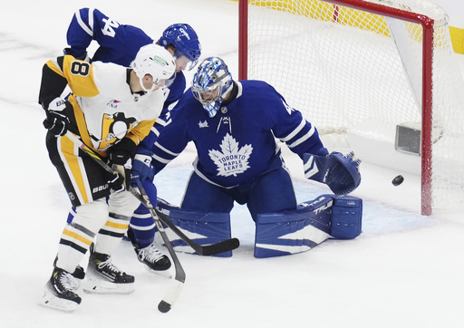 Marner boosts Toronto to a 4-2 victory over Pittsburgh Penguins in Maple Leafs’ season opener at home