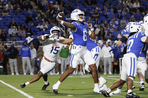 SMU, ranked 22nd, edges past Duke 28-27 in overtime as Blue Devils miss game-winning 2-point try.