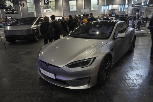 A Tesla vehicle collides and ignites in France, resulting in four fatalities.