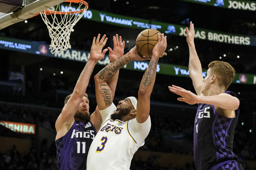 LeBron James achieves triple-double, while Davis tallies 31 in Lakers’ 131-127 victory against Kings