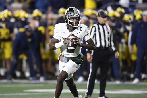 Colston Loveland’s two touchdown receptions and a successful 2-point conversion lead Michigan to a 24-17 victory over Michigan State.