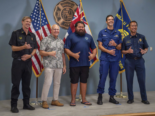 A Hawaii lifeguard on his day off aided in the overnight rescue of a stranded teenage kayaker.