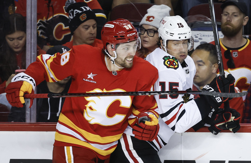 Matt Coronato nets two goals as Flames remain undefeated with a 3-1 victory against the Blackhawks.