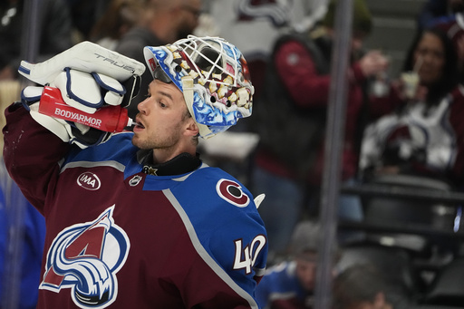 MacKinnon nets overtime goal, leading Avalanche to 4-3 victory over Ducks for their inaugural win