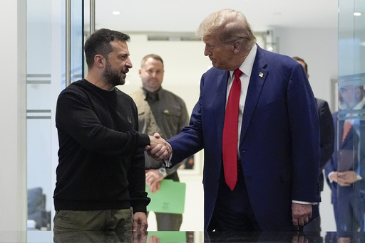 FILE - Republican presidential nominee former President Donald Trump, right, and Ukraine's President Volodymyr Zelenskyy shake hands during their meeting at Trump Tower, on Sept. 27, 2024, in New York. (AP Photo/Julia Demaree Nikhinson, File)