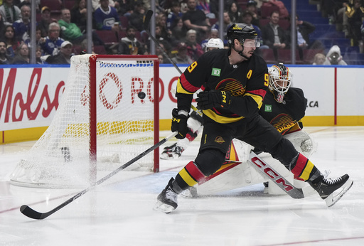 Hischier nets a goal and two assists while Markstrom records a shutout in Devils’ 6-0 triumph over Canucks