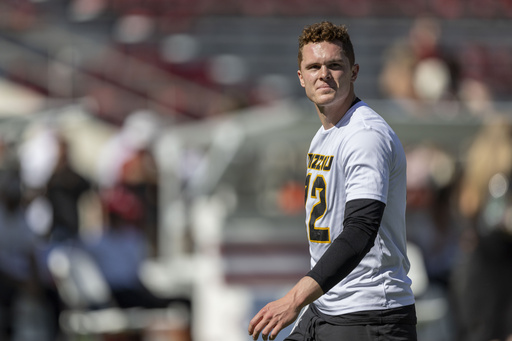 Missouri’s Brady Cook takes the field against Alabama after being labeled a game-time choice.