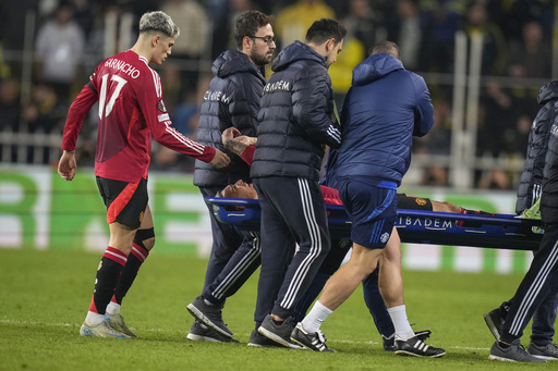 Manchester United’s Antony sporting a protective boot following injury setback