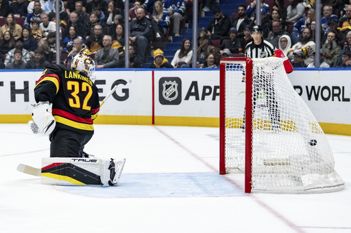 Canucks edge out faltering Penguins 4-3 with a surge of goals in the second period