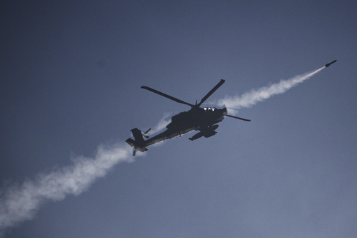 Israeli airstrike on hospital tent facility claims four lives, sparking a blaze that affects many.